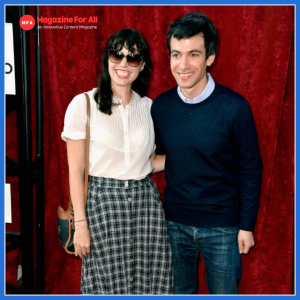 At an event, a man and woman stand side by side; the woman is Sarah Ziolkowska, known as Nathan Fielder’s ex-wife.