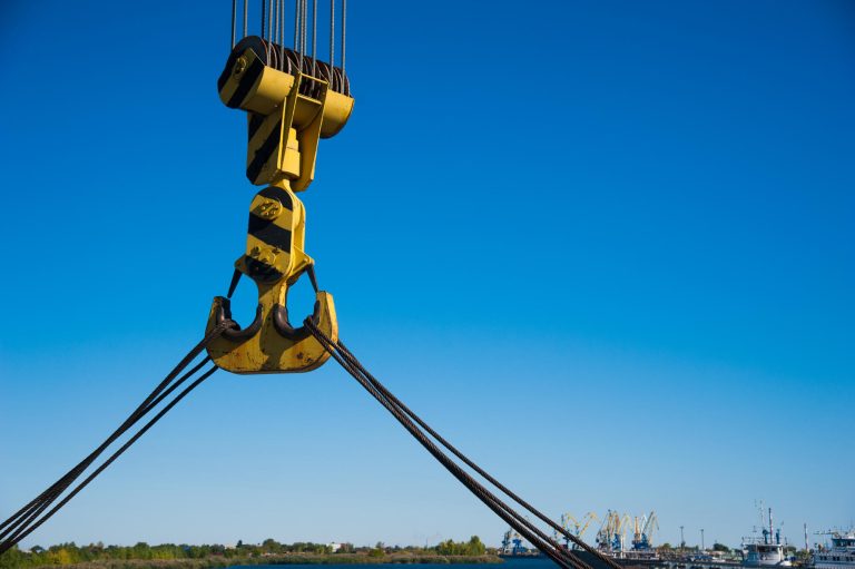 Loading,In,Port.,Floating,Port,Crane,On,Blue,Sky,Background