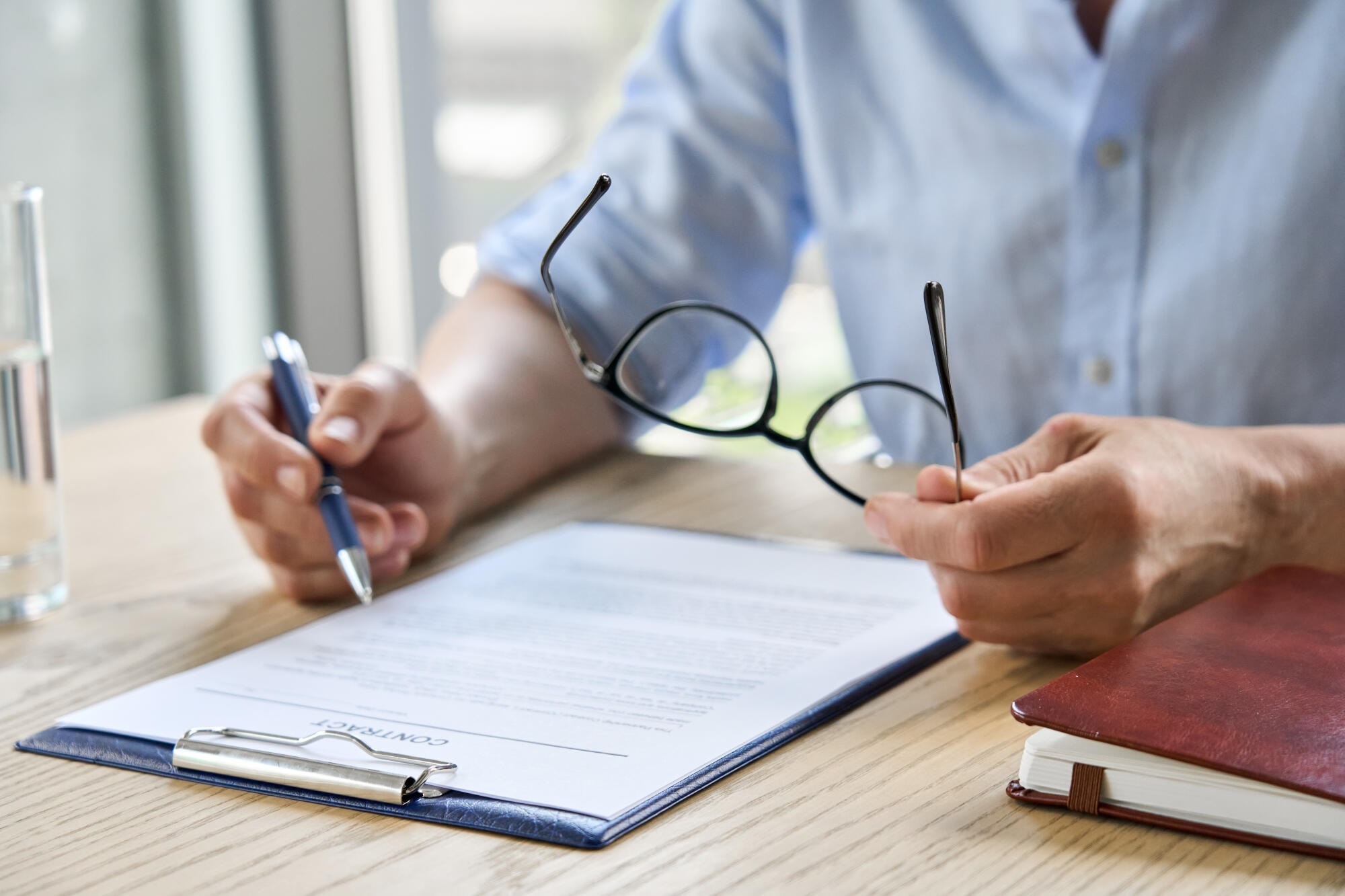 Businesswoman,Lawyer,Reading,Trust,Partnership,Contract,Sit,At,Table,In