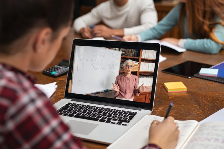 Teacher-explaining-lesson-in-v