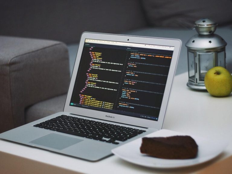 turned-on-MacBook-Air-beside-s